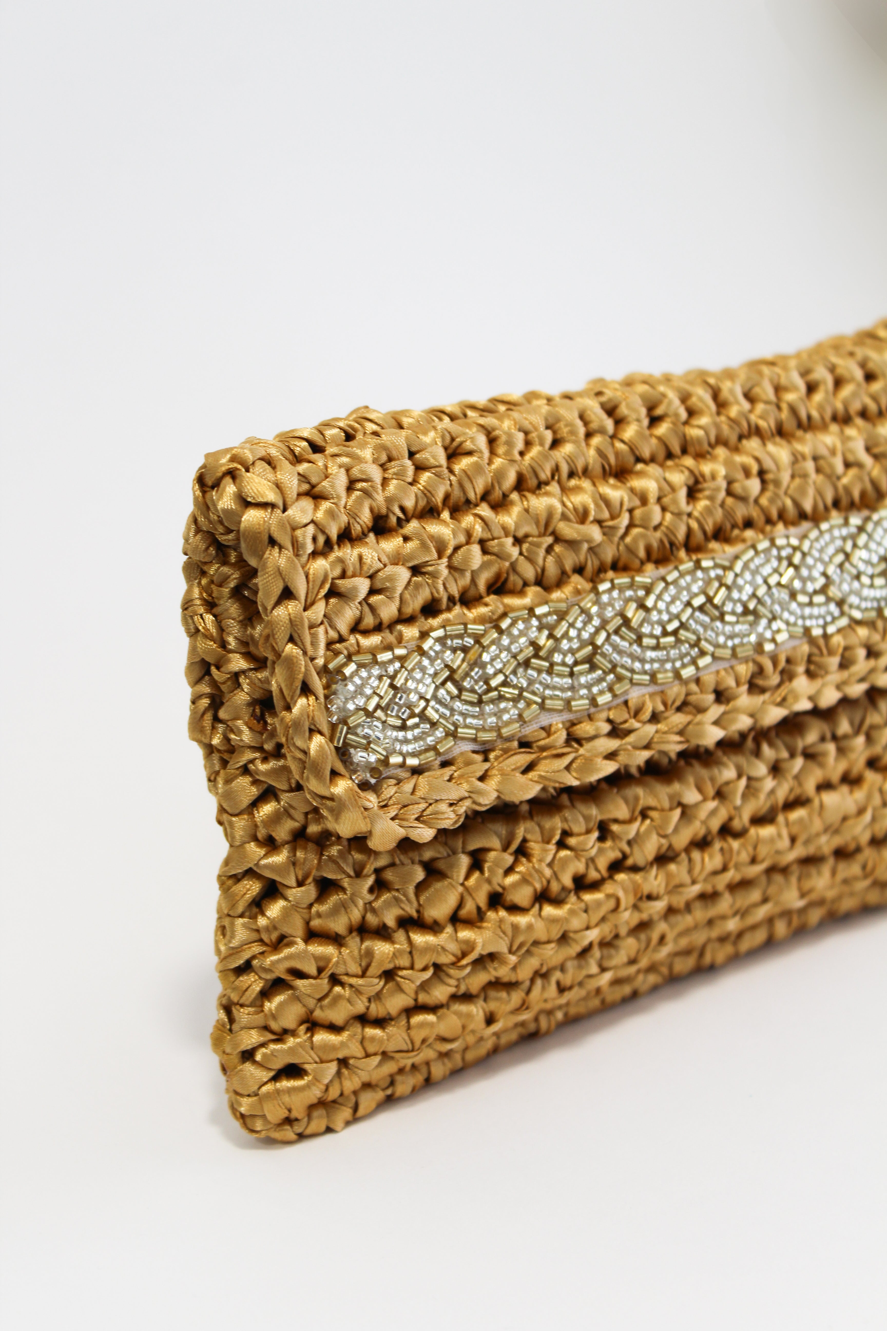 BOLSO DE MANO CON PEDRERÍA
